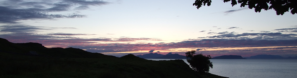 Islands of Rhum, Eigg and Muck from Air an Oir Ardnamurchan Scotland